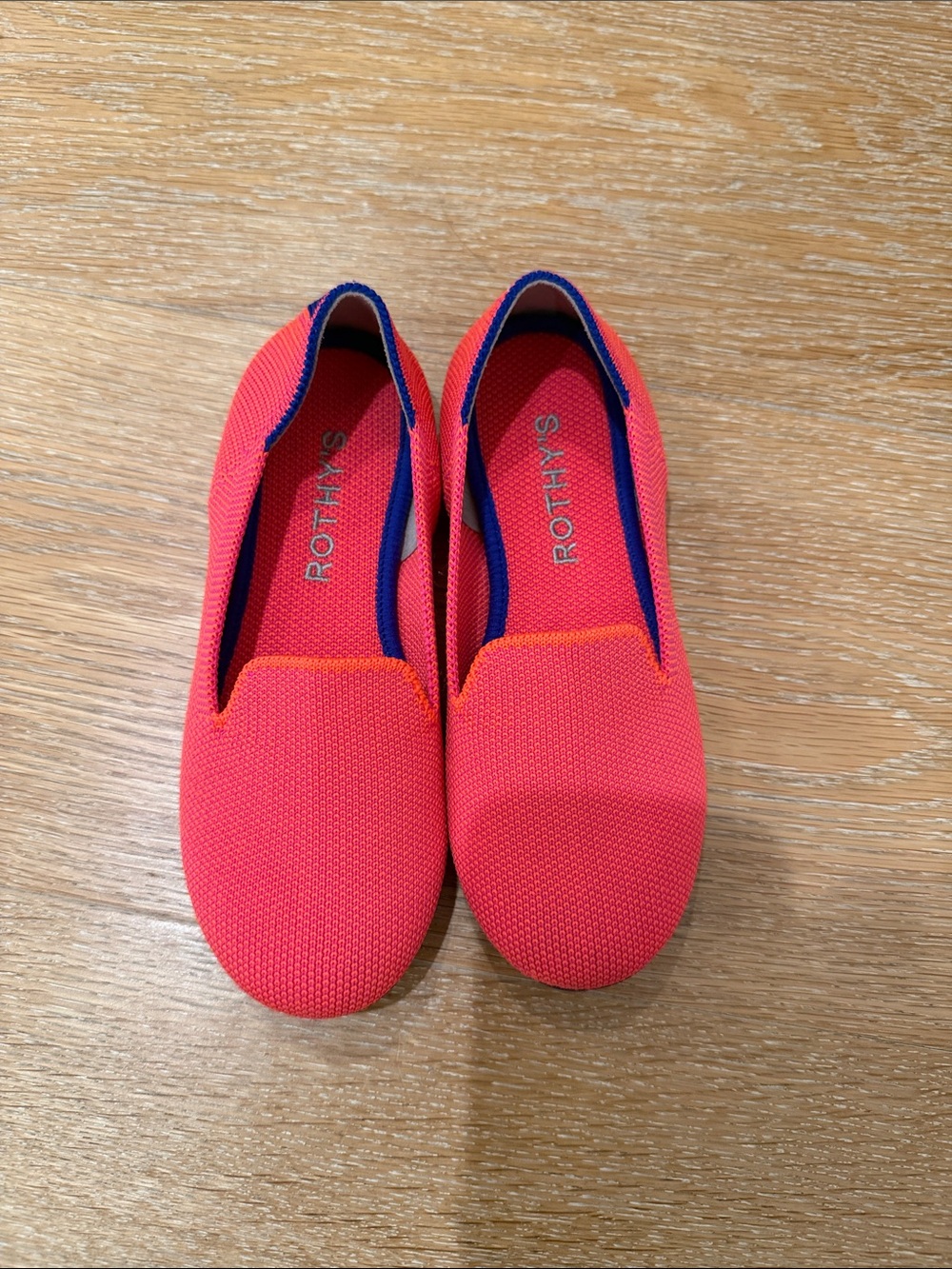 Rothy's Kids Slip-Ons in Coral with Navy Trim